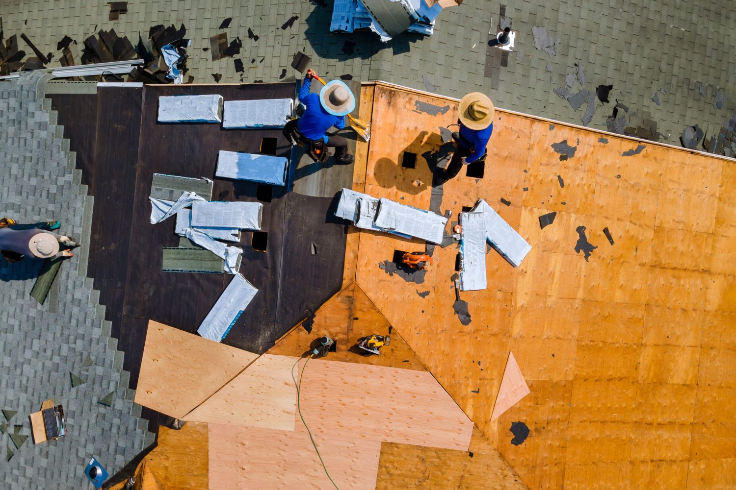 construction-roofer-installing-roof-tiles-at-house-2024-07-25-18-51-39-utc-1-scaled.jpg